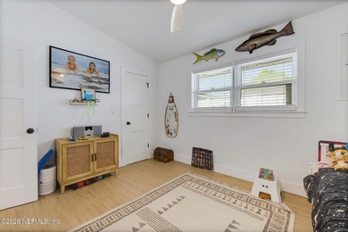 Thoughtfully renovated inside and out, this Neptune Beach home - photo 34