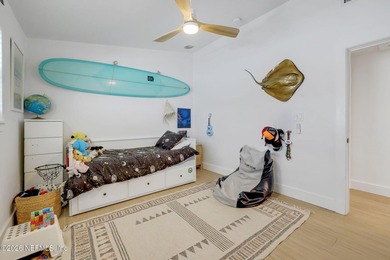 Thoughtfully renovated inside and out, this Neptune Beach home - photo 35