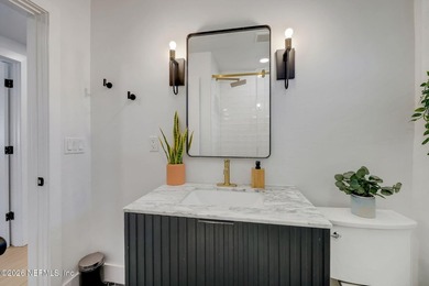 Thoughtfully renovated inside and out, this Neptune Beach home - photo 40