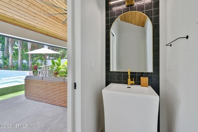 Thoughtfully renovated inside and out, this Neptune Beach home - photo 45