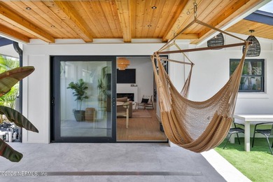 Thoughtfully renovated inside and out, this Neptune Beach home - photo 49