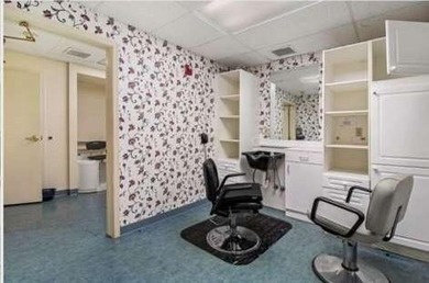 This spacious three-story assisted living facility at 5690 State