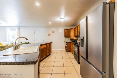 Escape the ordinary! This move-in-ready 4-bedroom, 2-bath home - photo 19