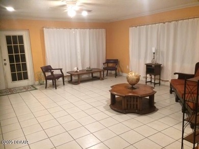 This well-maintained 1,500 sq. ft. concrete block home offers - photo 3