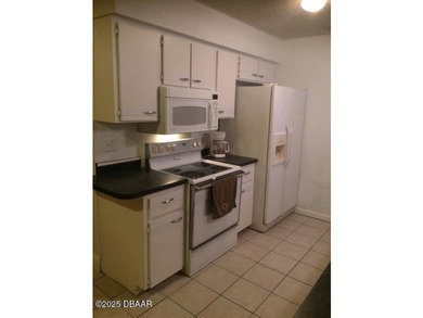 This well-maintained 1,500 sq. ft. concrete block home offers - photo 8