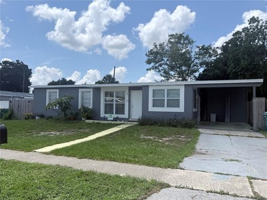 Opportunity awaits in this classic 1969 Port Charlotte home - photo 1