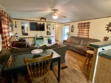 Enjoy peaceful country living in this 16x80 mobile home situated - photo 2