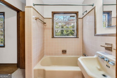 Investor or Owner Opportunity! Own a classic four-sided brick