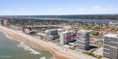 Experience the ultimate beachfront lifestyle in this stunning - photo 1