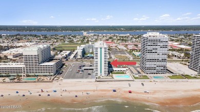 Experience the ultimate beachfront lifestyle in this stunning - photo 2