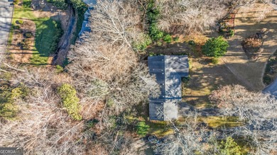 Investor or Owner Opportunity! Own a classic four-sided brick