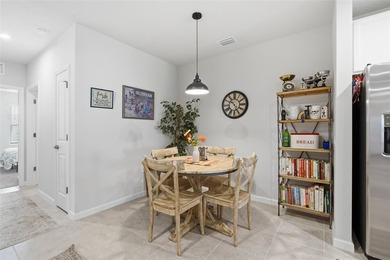 Experience low-maintenance living in this partially furnished - photo 6