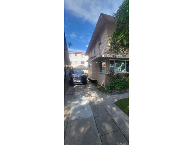 Discover the potential of this Duplex located at 411 E 8th - photo 3