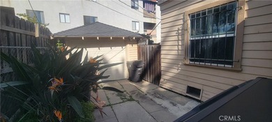 Discover the potential of this Duplex located at 411 E 8th - photo 4