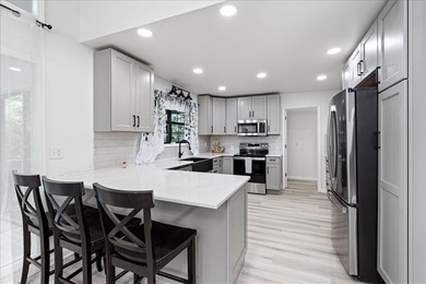 Stunning, move-in ready and walking distance from outdoor