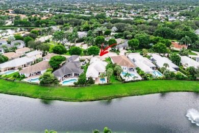Lake Home For Sale in Palm Beach Gardens, Florida