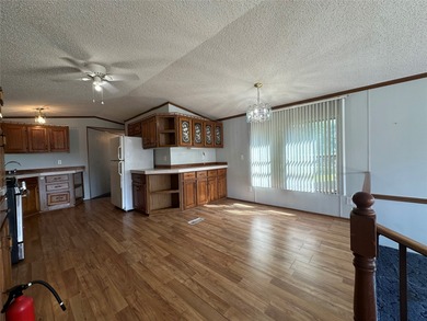 This manufacture homes has been converted to real property. Pier - photo 10