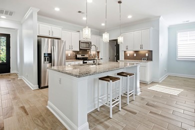 Welcome to this must see four bedroom, three and a half bath