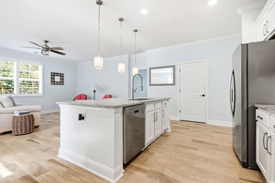 Welcome to this must see four bedroom, three and a half bath