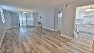 COASTAL LIVING AT ITS FINEST JUST STEPS TO THE BEACH. This unit - photo 3