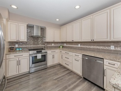 If you've been searching for a spacious townhome that lives like - photo 3