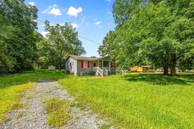 Escape to peaceful country living in this charming 3-bedroom - photo 32