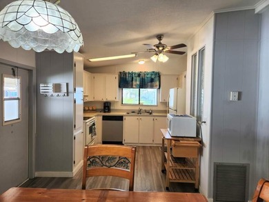Bright and airy home's interior was completely painted and - photo 9