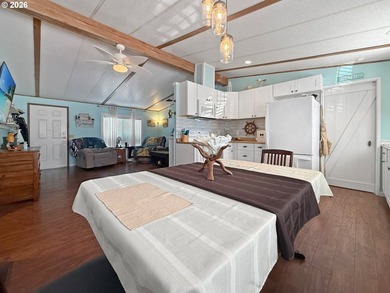 Coastal Cottage Charm Awaits! Bursting with personality, color - photo 11