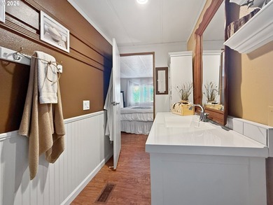 Coastal Cottage Charm Awaits! Bursting with personality, color - photo 18