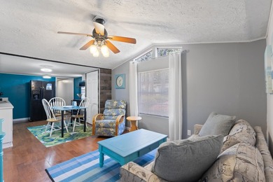 **Price Improvement** Kitchen-First Coastal Living. Step inside - photo 25