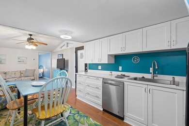 **Price Improvement** Kitchen-First Coastal Living. Step inside - photo 42