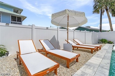 Welcome to your fully renovated coastal retreat, perfectly - photo 6