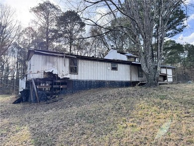 This property at 80 Pine Needle Trail presents a unique - photo 2