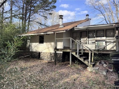 This property at 80 Pine Needle Trail presents a unique - photo 4