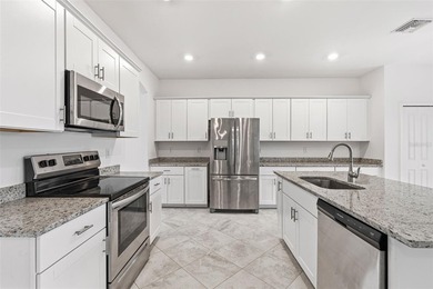 Virtually Staged. Waterfront home with a private heated pool and - photo 4