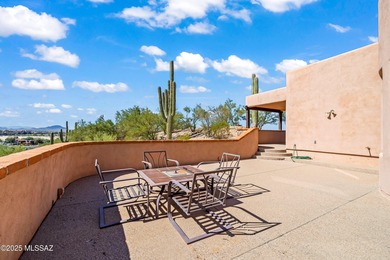 Welcome to 30 W. Stone Loop, a bright and lofty ridge-top home