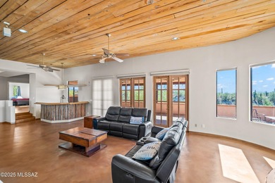 Welcome to 30 W. Stone Loop, a bright and lofty ridge-top home