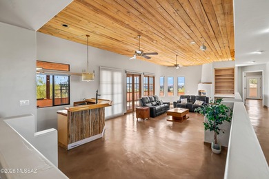 Welcome to 30 W. Stone Loop, a bright and lofty ridge-top home