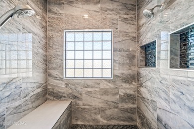 Welcome to 30 W. Stone Loop, a bright and lofty ridge-top home