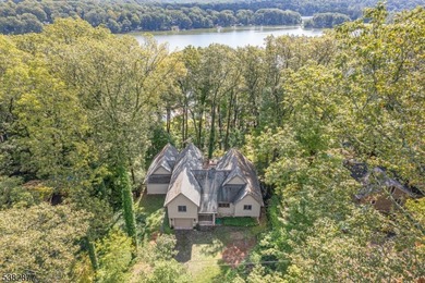 Contemporary Elegance with Stunning Lake Views. Welcome to this - photo 1