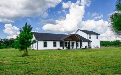 Tucked away on 3.01 private acres in the Ouachita Mountains - photo 2
