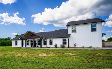 Tucked away on 3.01 private acres in the Ouachita Mountains - photo 3