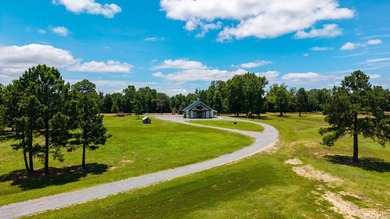 Private barndominium retreat on approximately 71 acres behind a - photo 2