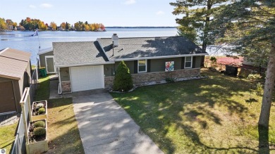 Lake Mitchell Home For Sale in Cadillac Michigan