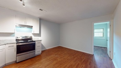 Welcome home to 40 Bee Street #111: right downtown across from