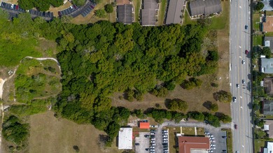 This prime 4.87-acre parcel is strategically located in a highly - photo 8