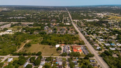 This prime 4.87-acre parcel is strategically located in a highly - photo 9