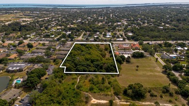 This prime 4.87-acre parcel is strategically located in a highly - photo 10