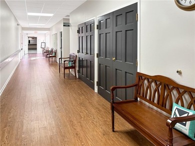 WALK-IN TUB and gleaming hardwoods and washer/dryer in unit in