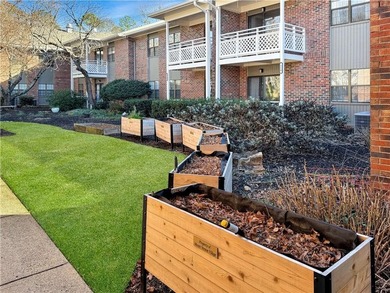 WALK-IN TUB and gleaming hardwoods and washer/dryer in unit in